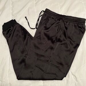 Black satin feel cargo pants from Forever 21. Size medium.